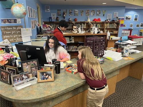 Book Squad scholars at work in the library