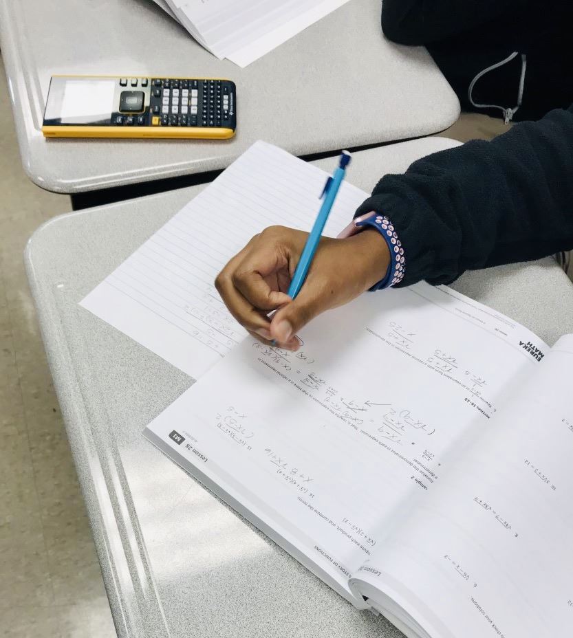 Student working on math homework Student working on math homework